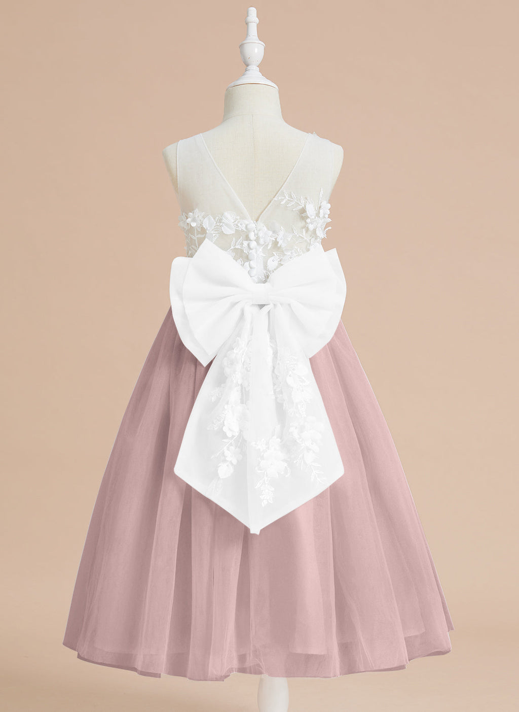Vestido midi de encaje floral y lazo grande 