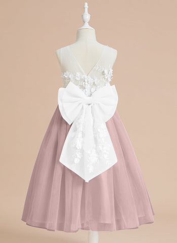 Vestido midi de encaje floral y lazo grande 