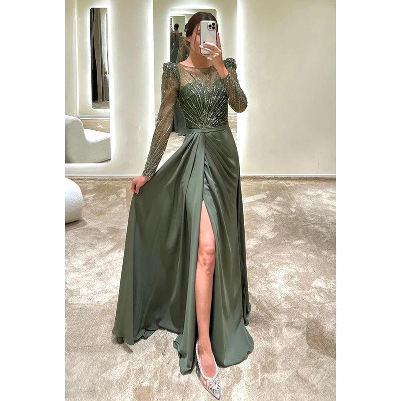 Robe de soirée longue trapèze à col rond et manches longues ornée de perles