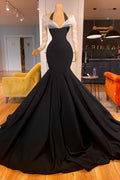 Superbe robe de bal sirène à manches longues et col licou avec volants