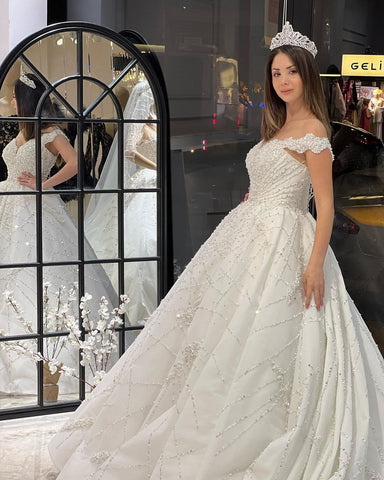 Fabuloso vestido de novia largo hasta el suelo, escote corazón, hombros descubiertos, corte en A, lentejuelas y volantes