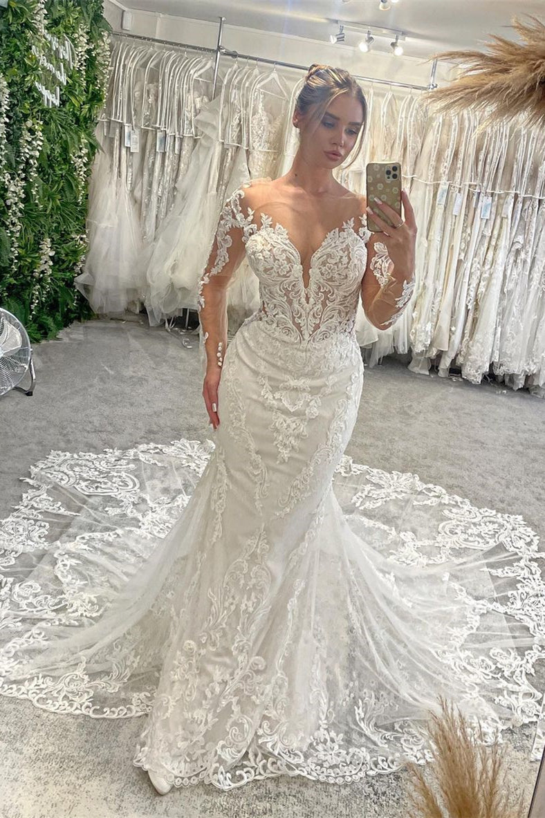 Fabuloso vestido de novia de sirena con encaje, escote en V, mangas largas y cola de capilla, hasta el suelo.