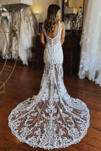 Robe de mariée sirène en dentelle à fines bretelles et fente
