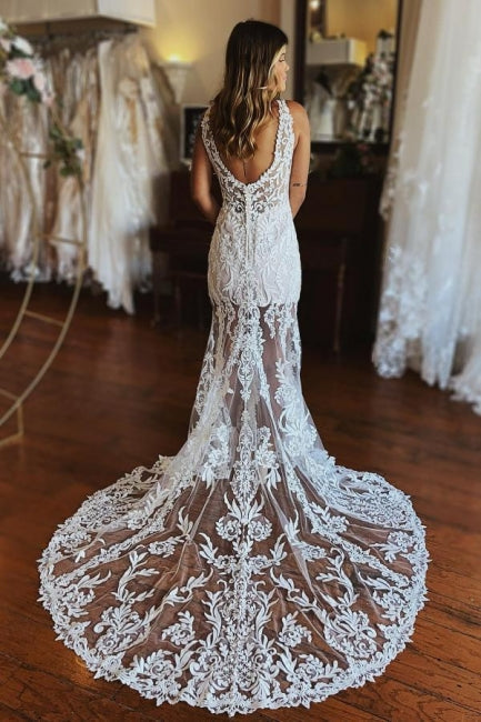 Robe de mariée sirène en dentelle à fines bretelles et fente