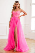 Robe de bal fuchsia deux pièces à fines bretelles et fente sur le devant