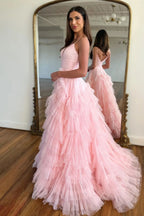 Vestido largo de fiesta rosa con tirantes finos, corte en A y volantes