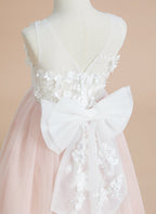 Vestido midi de encaje floral y lazo grande 