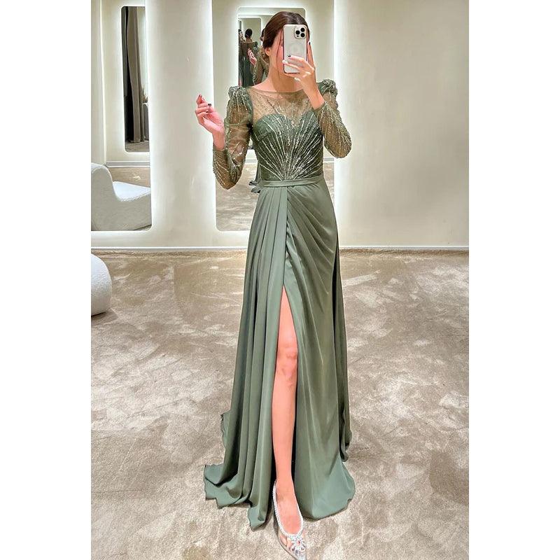 Robe de soirée longue trapèze à col rond et manches longues ornée de perles