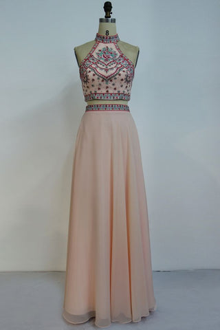 Robe de bal deux pièces en mousseline à appliques, longue dos nu et coupe trapèze, ornée de deux pièces