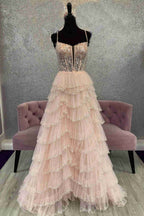 Vestido largo de fiesta negro con tirantes, malla recortada, lentejuelas y capas