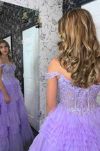 Robe de bal longue en tulle à épaules dénudées et à volants étagés