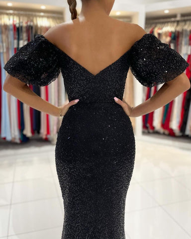 Robe de bal sirène noire glamour à sequins, longue fente, épaules dénudées