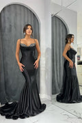 Robe de soirée sirène longue noire glamour à bretelles spaghetti et paillettes