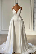 Glamuroso vestido de novia largo color marfil, corte en A, escote en V, sin mangas, de encaje