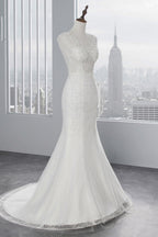 Glamuroso vestido de novia largo de sirena con apliques de tul y encaje