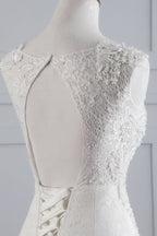 Glamuroso vestido de novia largo de sirena con apliques de tul y encaje