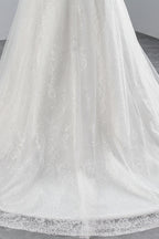 Glamuroso vestido de novia largo de sirena con apliques de tul y encaje