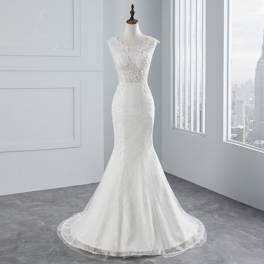 Glamuroso vestido de novia largo de sirena con apliques de tul y encaje