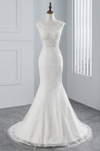 Glamuroso vestido de novia largo de sirena con apliques de tul y encaje
