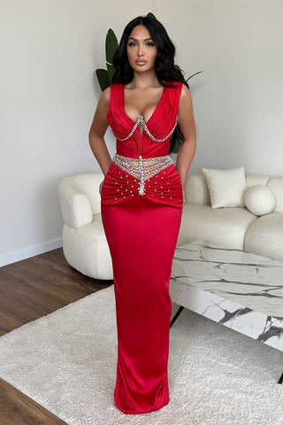 Glamuroso vestido largo de sirena sin mangas con escote en V y pedrería