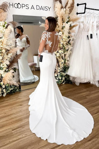 Vestido de novia sirena de encaje floral con espalda descubierta y mangas largas, glamuroso y elegante
