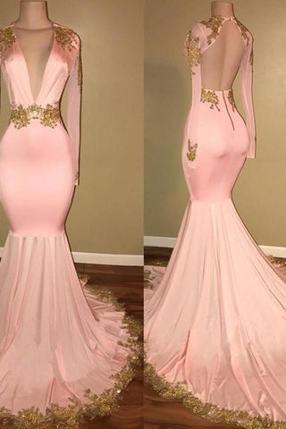 Vestidos de gala de sirena sin mangas con escote en V y detalles de cristal dorado.