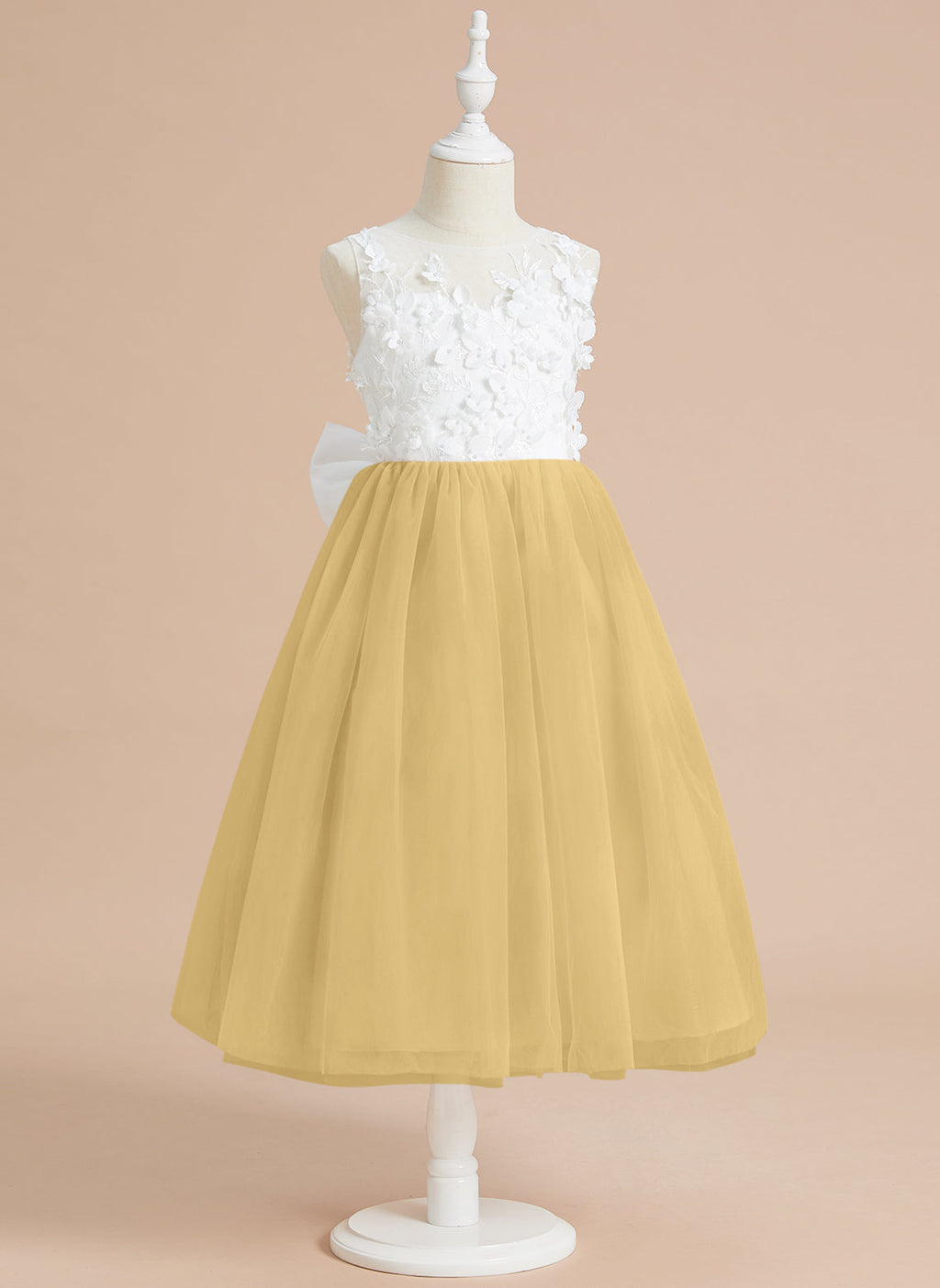 Vestido midi de encaje floral y lazo grande 
