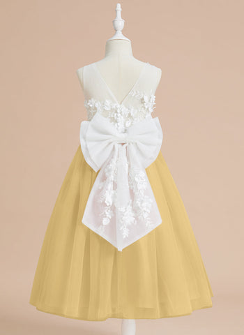 Vestido midi de encaje floral y lazo grande 