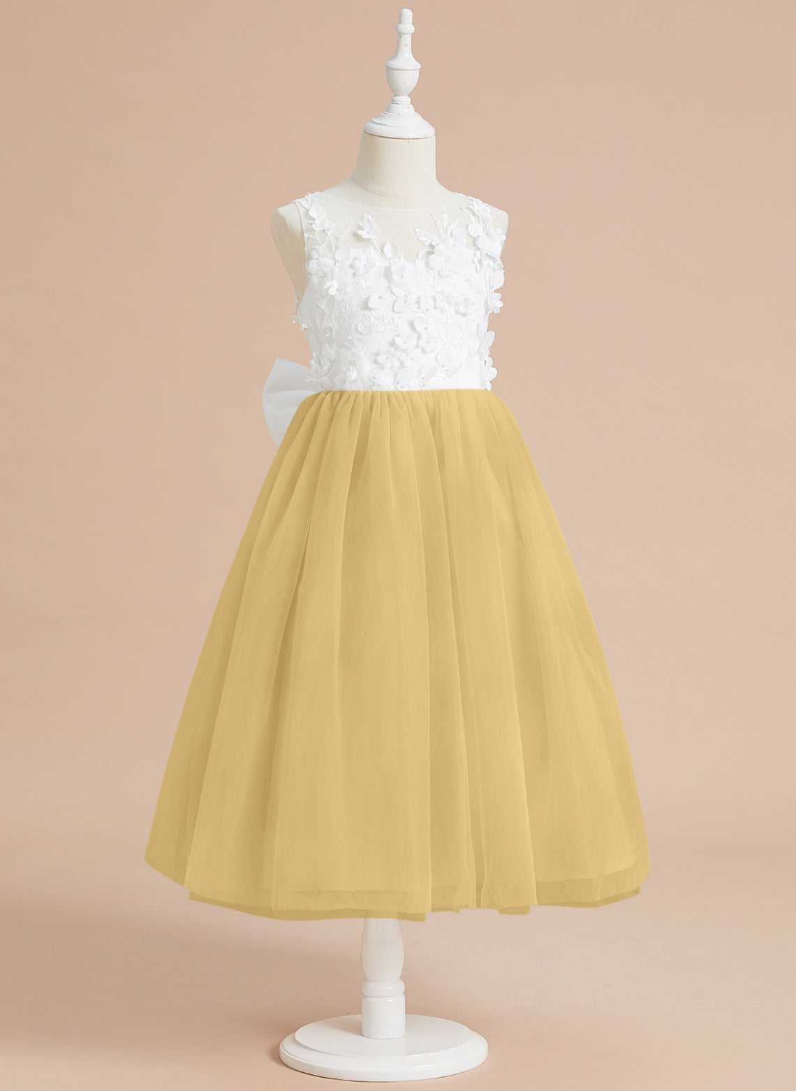 Vestido midi de encaje floral y lazo grande 