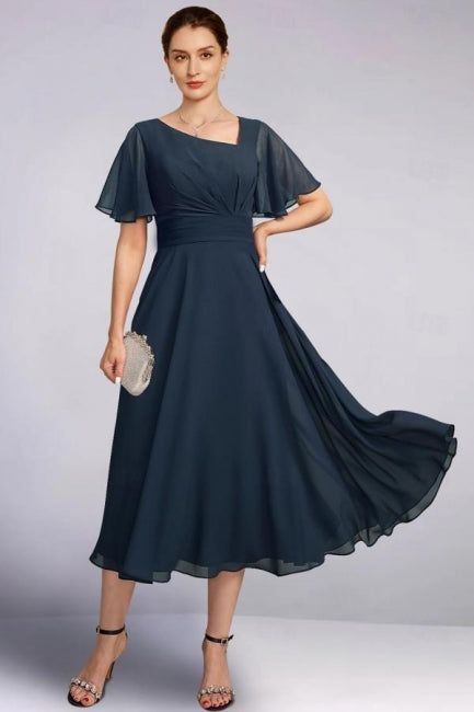 Precioso vestido de corte A para la madre de la novia, de gasa, con escote en V, mangas cortas y volantes.
