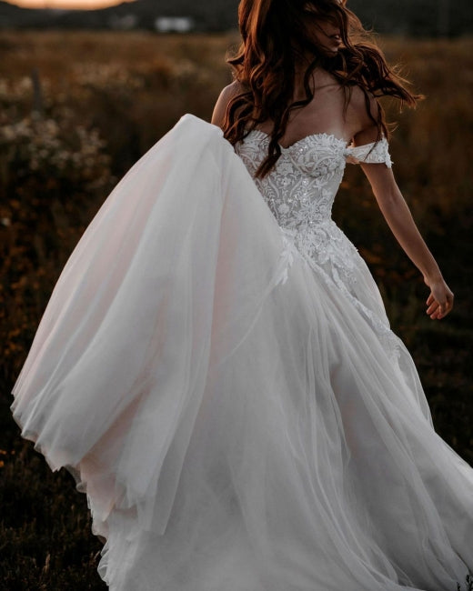 Magnifiques robes de mariée trapèze à épaules dénudées en dentelle