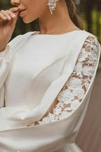 Magnifique robe de mariée blanche en satin, coupe trapèze, manches longues et appliques
