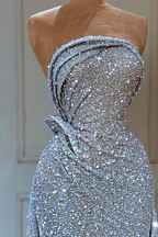 Superbe robe de bal trapèze sans manches à paillettes et volants