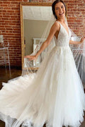 Precioso vestido de novia de tul corte A con escote en V y espalda descubierta con apliques WD514