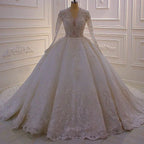 Magnifique robe de mariée blanche trapèze à col en V et manches longues en dentelle et sequins