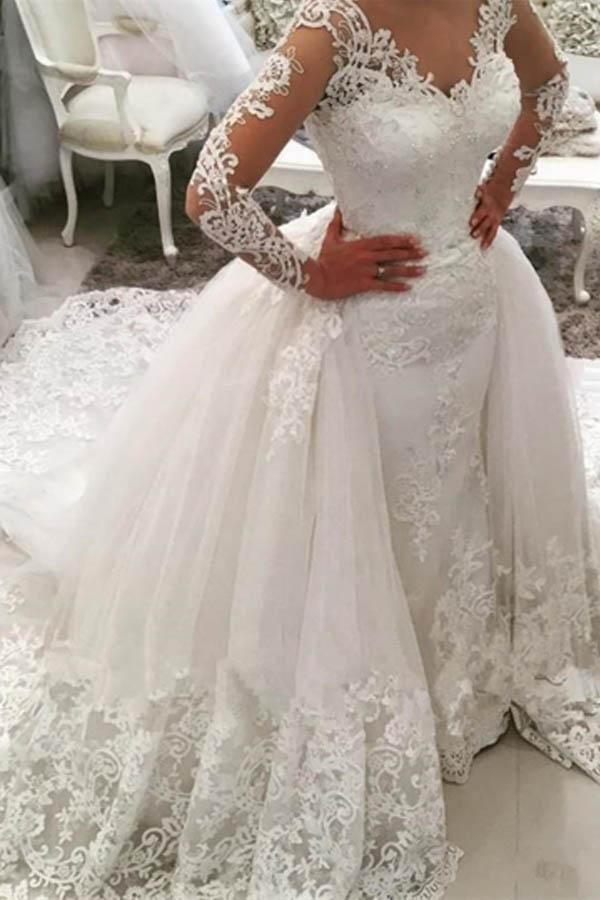 Magnifique robe de mariée sirène longue ivoire à col en V ornée d'appliqués en dentelle et de manches