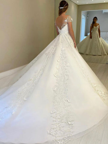 Preciosos vestidos de novia largos de corte A, con hombros descubiertos, encaje, espalda descubierta y mangas cortas.