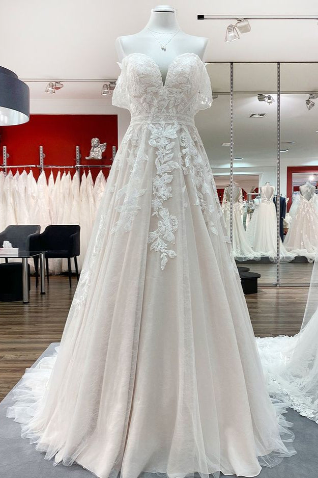 Precioso vestido de novia largo de corte A con hombros descubiertos, tul y apliques de encaje