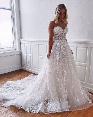 Precioso vestido de novia largo de encaje con escote corazón y corte en A