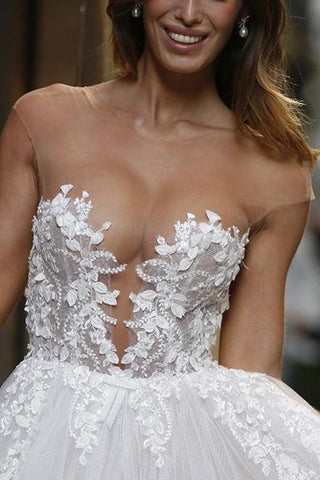 Precioso vestido de novia largo de corte A con apliques de tul y encaje