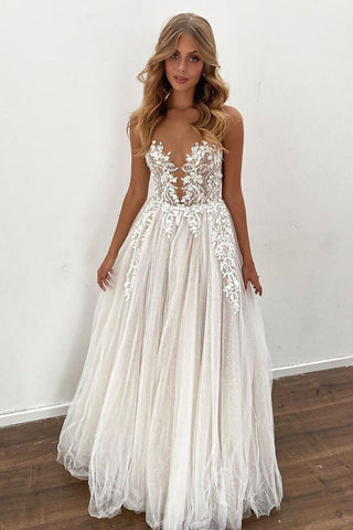 Precioso vestido de novia largo de corte A con apliques de tul y encaje