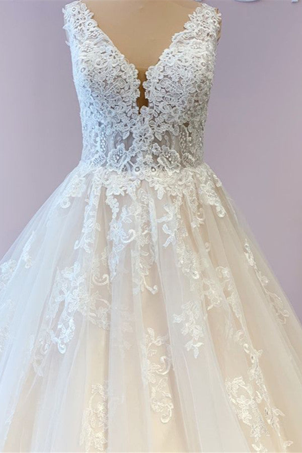 Precioso vestido de novia largo de corte A en tul con apliques de encaje