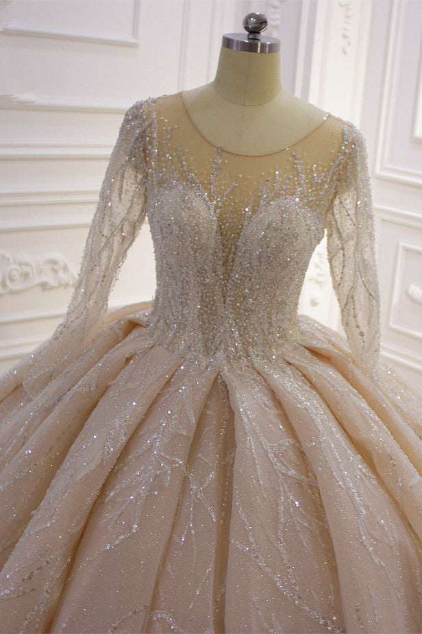 Magnifique robe de mariée longue de bal avec manches bateau et cristaux