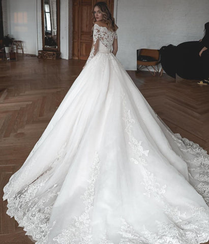 Preciosos vestidos de novia largos de corte princesa, de encaje y tul, con mangas.