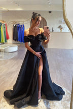 Superbe robe de bal longue noire à épaules dénudées et perles avec fente