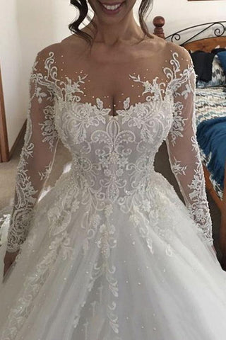Preciosos vestidos de novia largos de corte A en tul color marfil con encaje y mangas