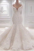Precioso vestido de novia largo de sirena con escote en V, apliques, encaje y volantes