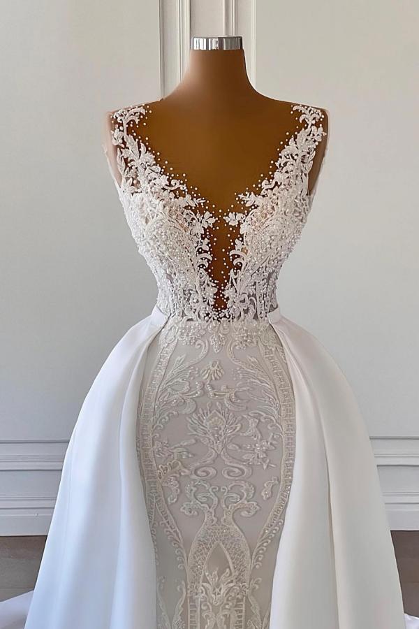Magnifique robe de mariée sirène longue en dentelle à col V et traîne amovible en satin.