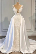 Magnifique robe de mariée sirène longue en dentelle à col V et traîne amovible en satin.