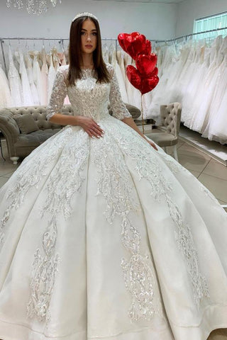 Precioso vestido de novia largo de princesa, estilo princesa, de satén, con escote barco, apliques de encaje y mangas.